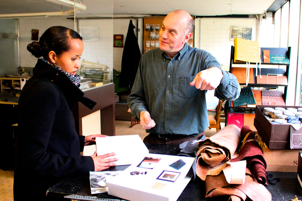 Guy Reyne in his leather atelier in Ghent in Belgium selecting leather for Puredistance
